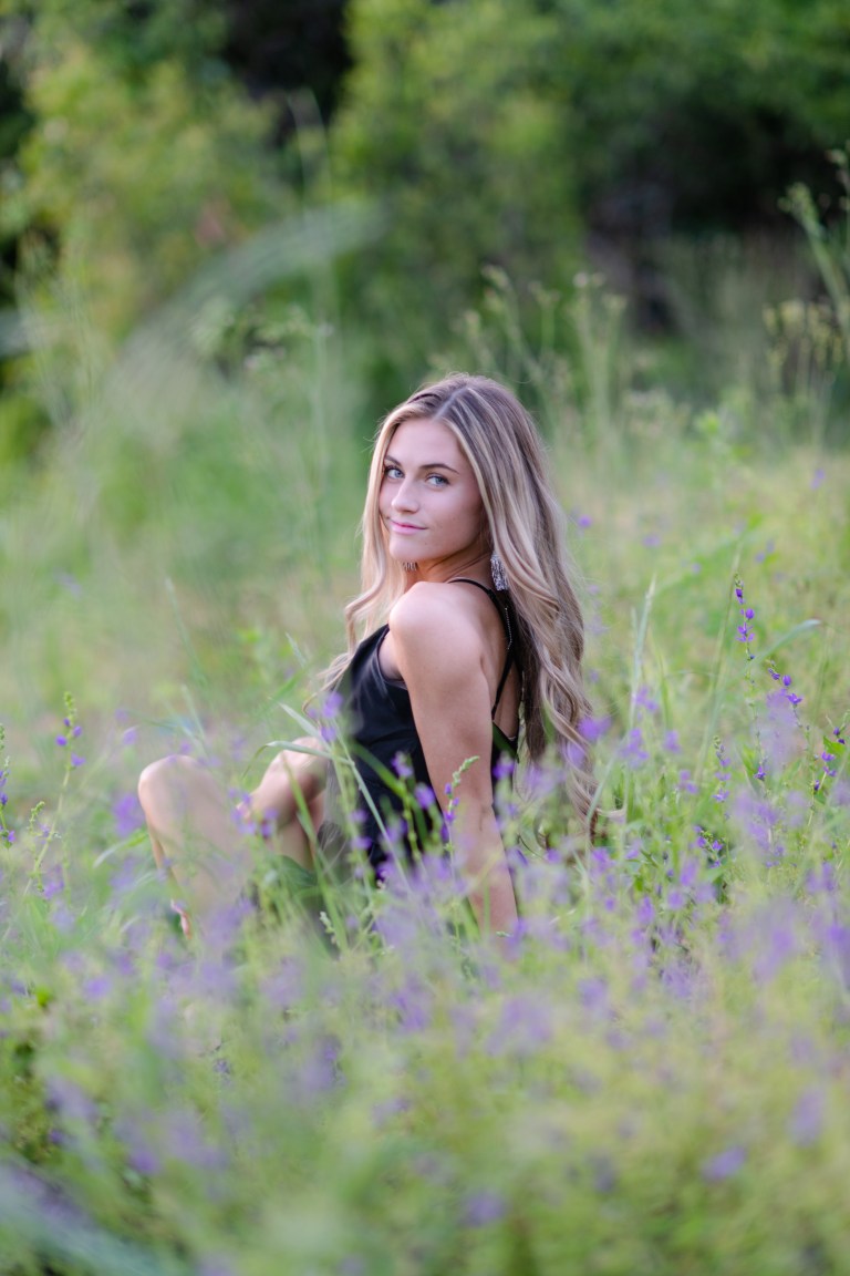 A girl in a field of flowers